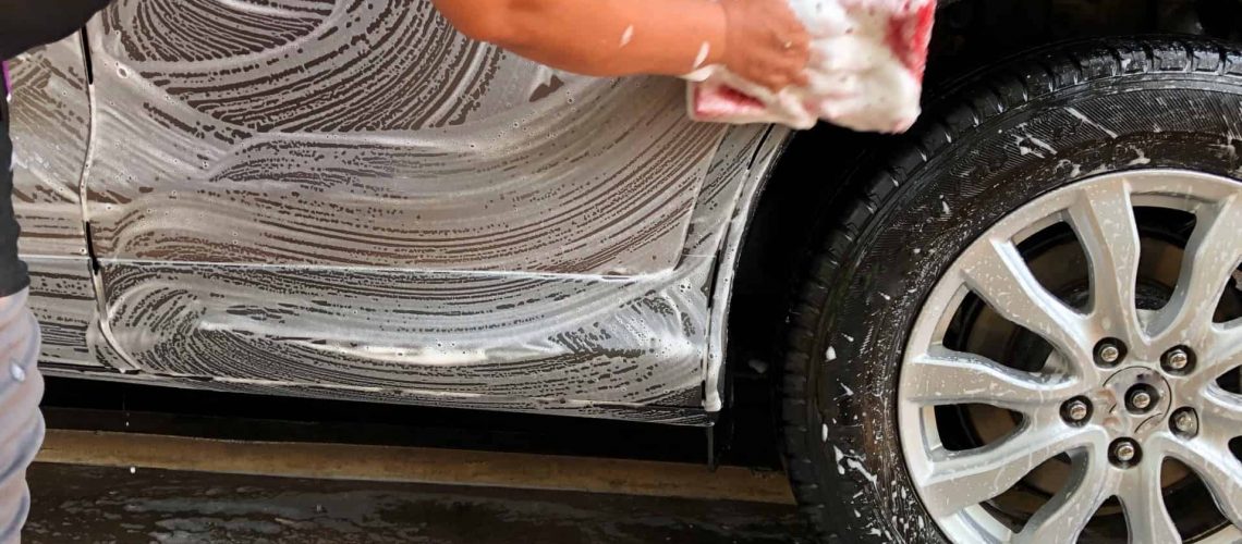 washing a silver car
